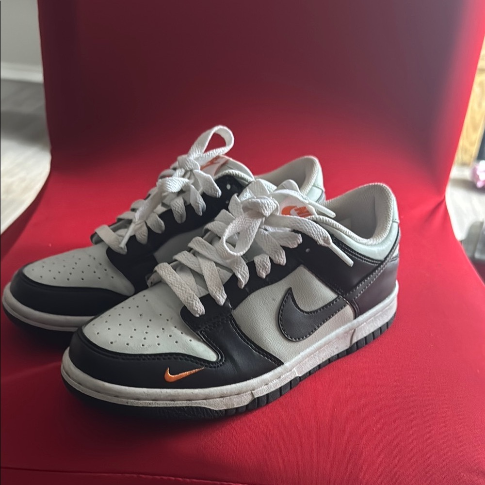Nike men Black and White Sneakers with Orange Details